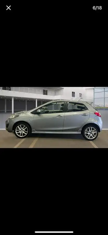2013-mazda-mazda2-13-tamura-5d-big-1