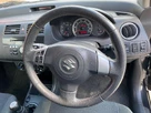 2009-suzuki-swift-13td-small-41