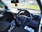 2010-toyota-iq-10-2-multidrive-small-1