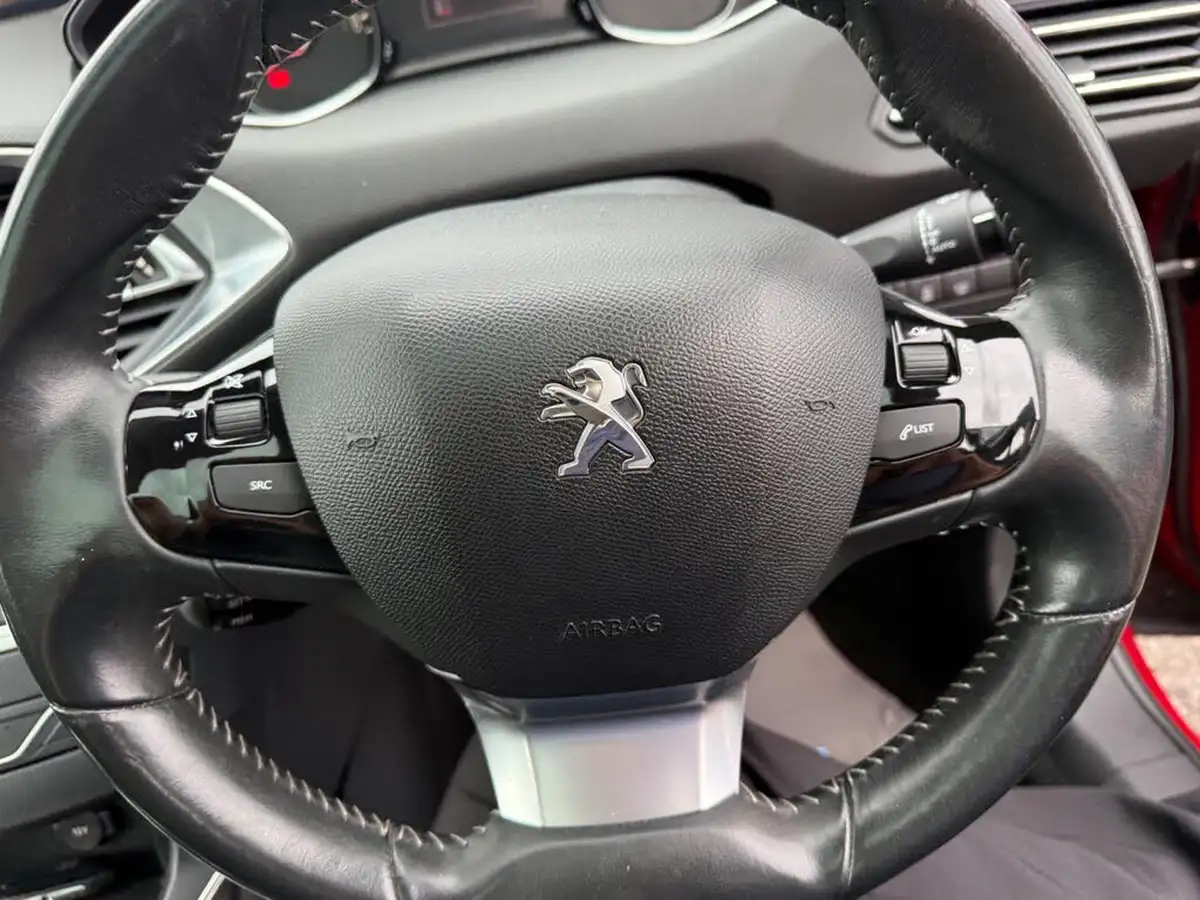 2014-peugeot-308-16td-feline-big-38