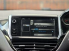 2013-peugeot-208-12-active-3d-small-26