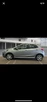 2013-mazda-mazda2-13-tamura-5d-small-1