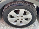 2009-suzuki-swift-13td-small-54