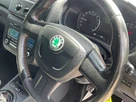 2013-skoda-fabia-16td-monte-carlo-small-77