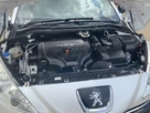 2012-peugeot-rcz-20td-gt-small-21