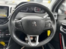 2014-peugeot-208-16e-hdi-roland-garros-small-10