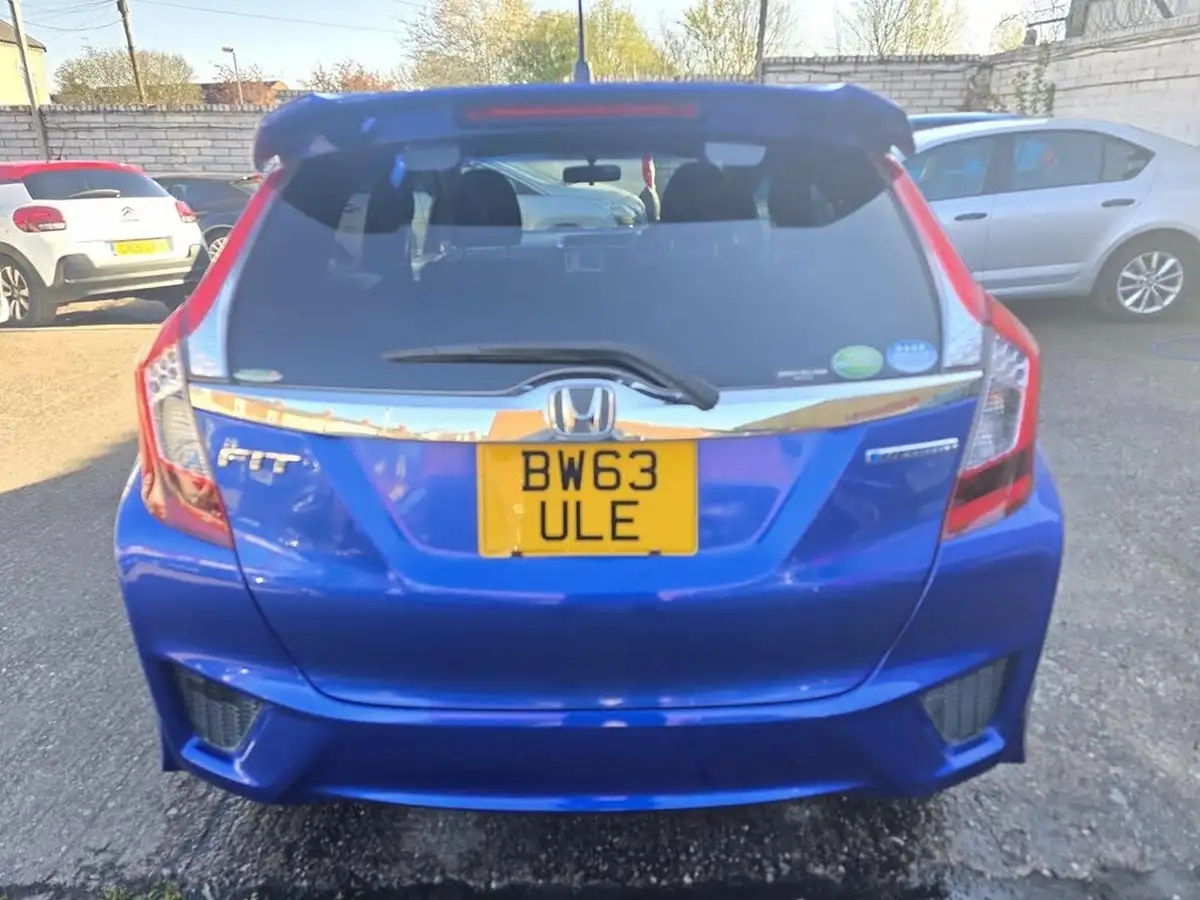2013-honda-fit-18-hybrid-cruise-big-3