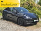 2022-tesla-model-y-e-long-range-small-0