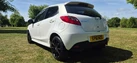 2011-mazda-mazda2-13-black-small-2