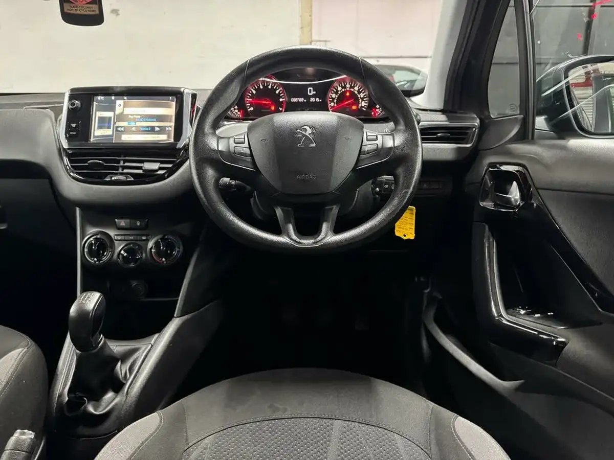 2013-peugeot-208-12-active-5d-big-25