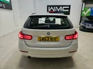 2014-bmw-3-series-20td-318d-se-touring-5d-small-6