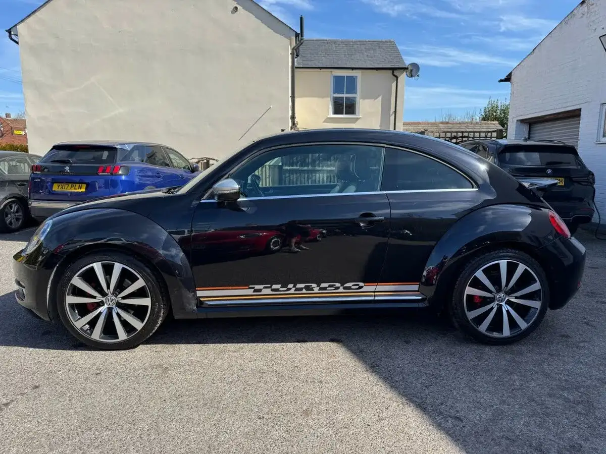 2014-volkswagen-beetle-20-turbo-silver-tsi-210ps-dsg-big-6