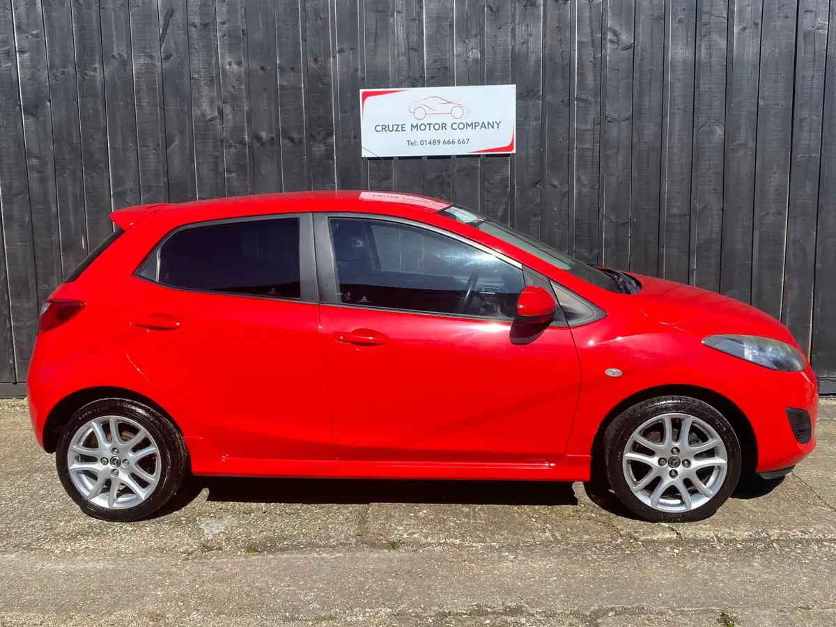 2013-mazda-mazda2-13-tamura-5d-big-2
