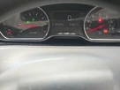 2013-peugeot-208-12-active-3d-small-16