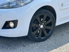 2014-peugeot-207-cc-16-roland-garros-small-17