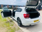 2013-bmw-1-series-16-116i-sport-ss-3d-small-7