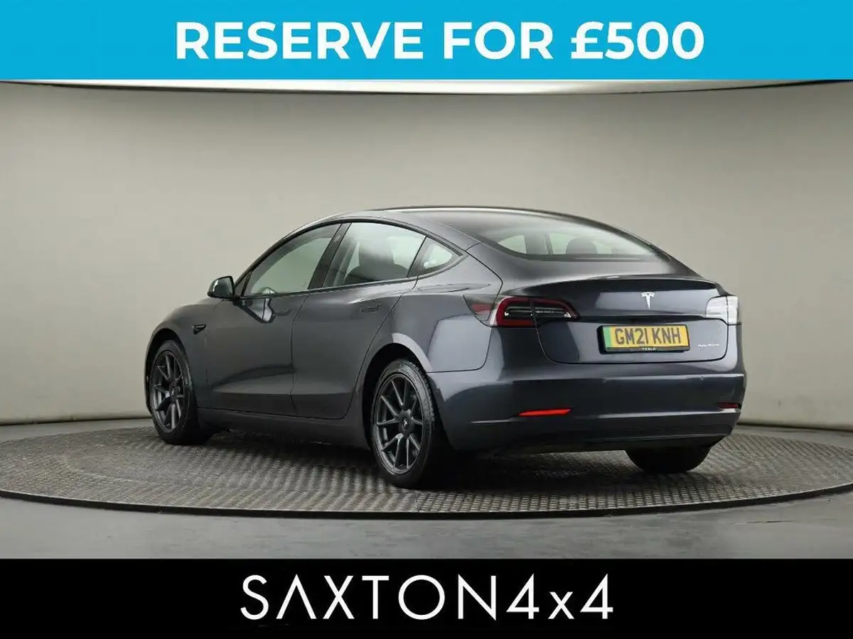 2021-tesla-model-3-e-long-range-4x4-big-1