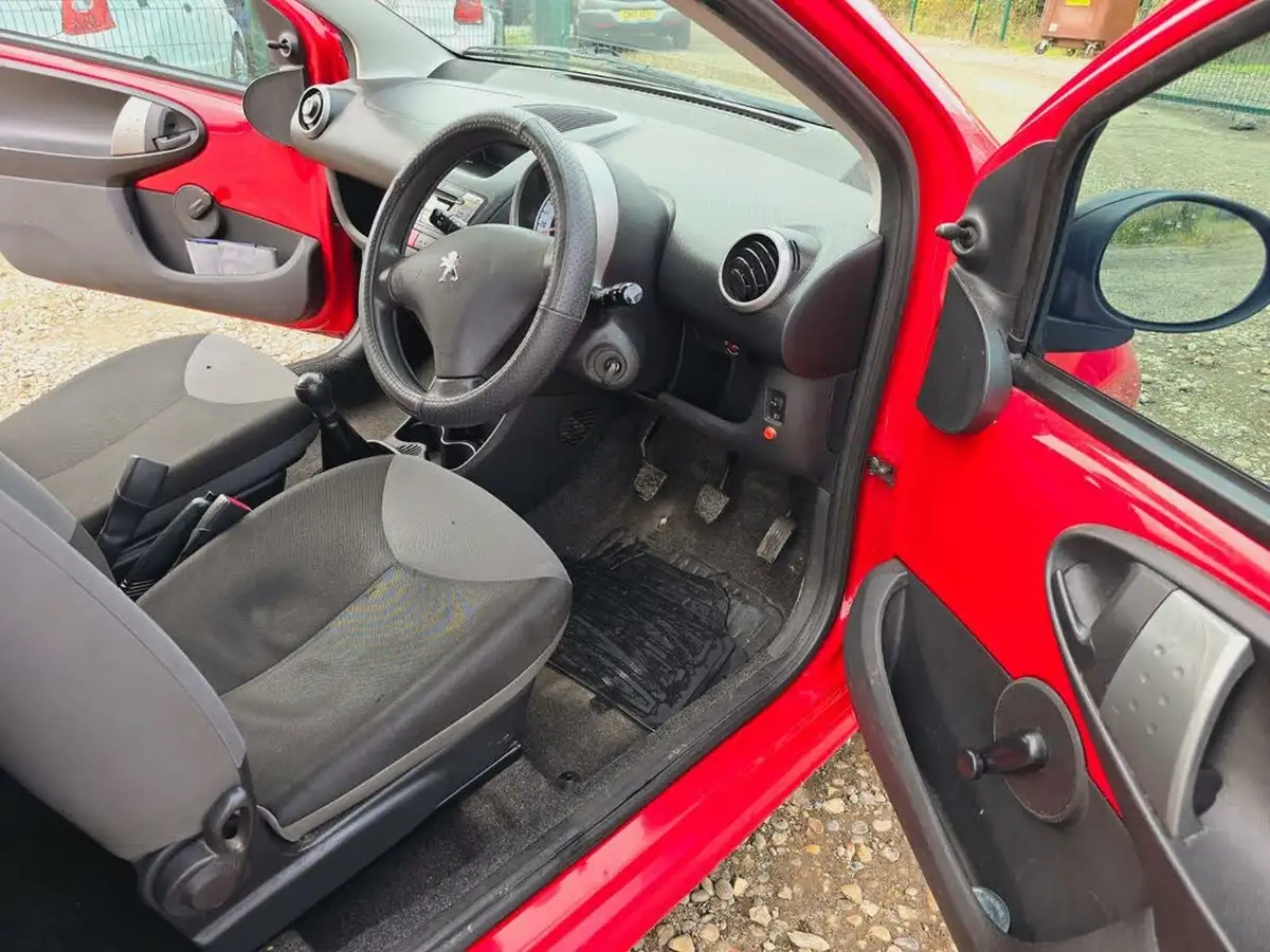2013-peugeot-107-10-access-big-5