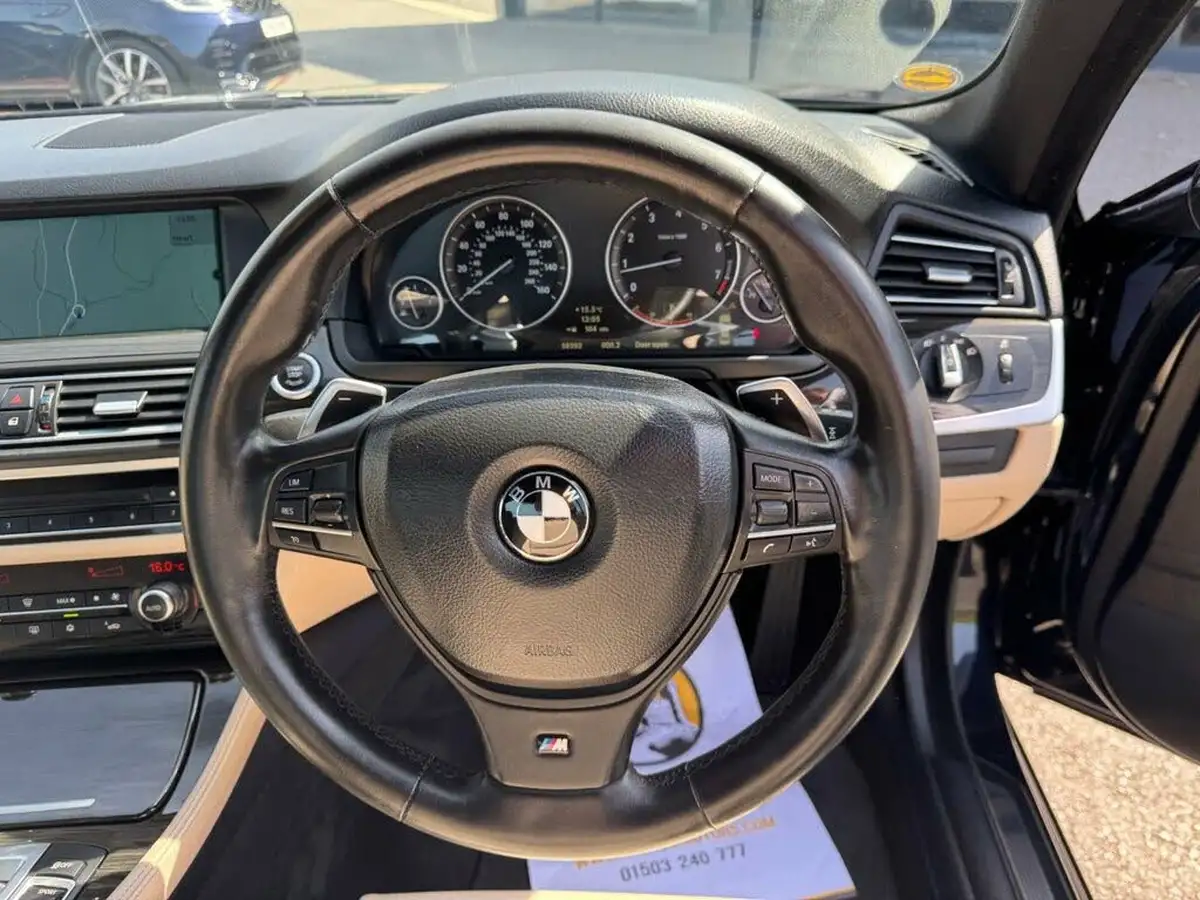 2010-bmw-5-series-44-550i-m-sport-big-9
