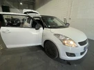2012-suzuki-swift-12-attitude-3d-small-43