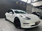 2020-tesla-model-3-e-performance-small-1