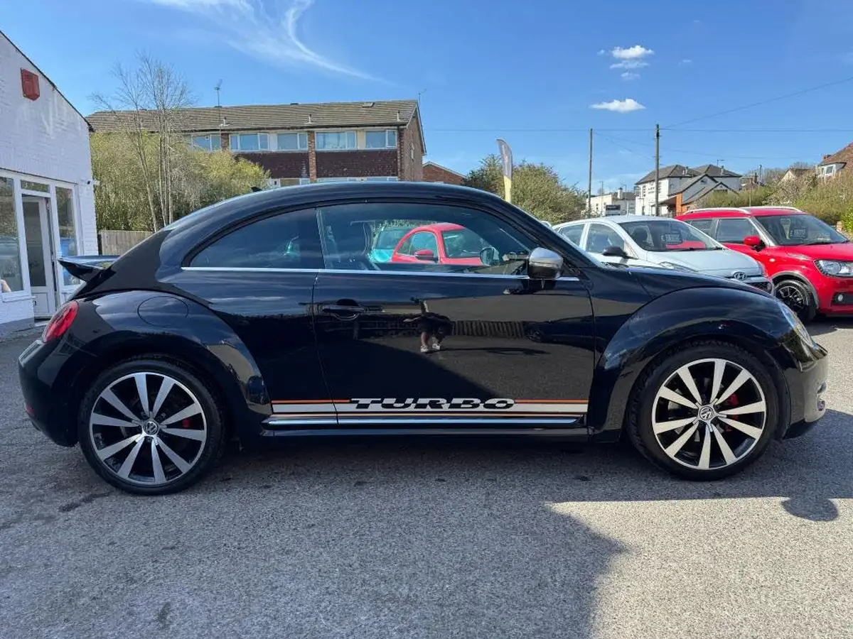 2014-volkswagen-beetle-20-turbo-silver-tsi-210ps-dsg-big-2