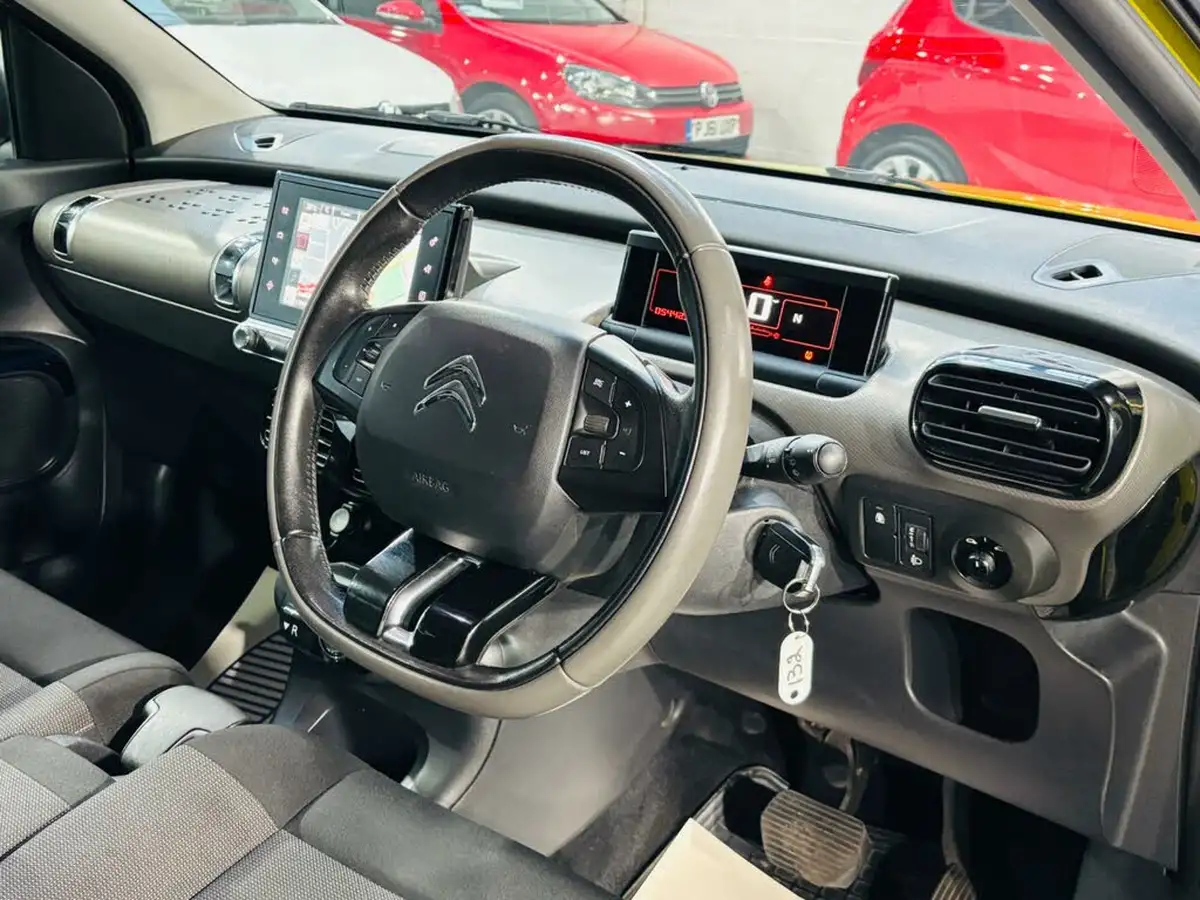 2016-citroen-c4-cactus-16bluehdi-flair-ss-etg6-big-11
