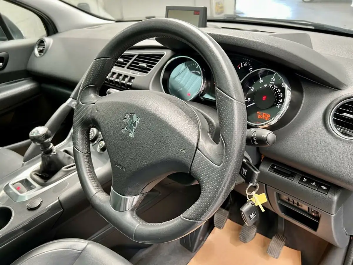 2012-peugeot-3008-crossover-16td-sportium-big-4
