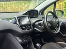 2013-peugeot-208-12-active-3d-small-14