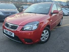 2010-kia-rio-14-strike-auto-small-3