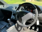 2012-peugeot-rcz-20td-gt-small-1