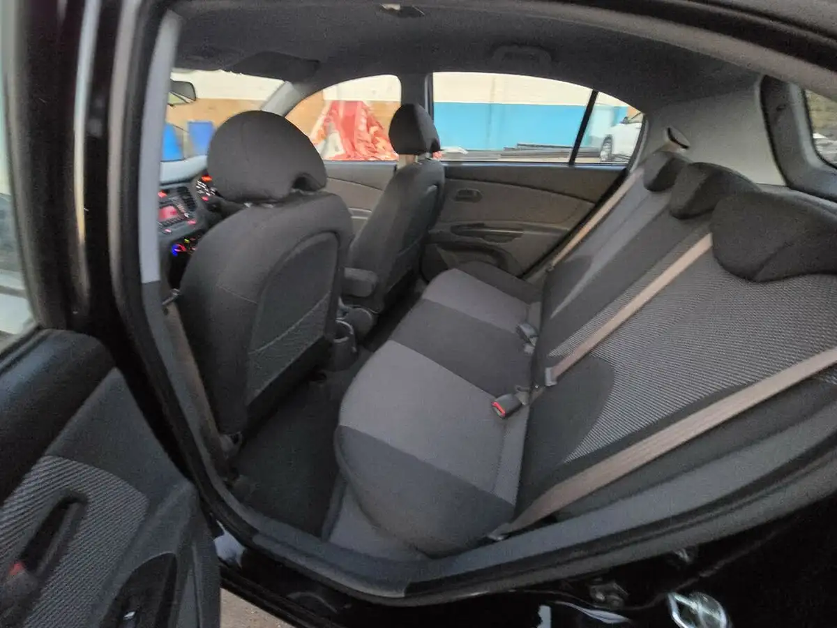 2010-kia-rio-14-domino-auto-big-13