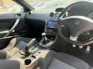 2011-peugeot-rcz-16-sport-156-small-8