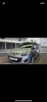 2013-mazda-mazda2-13-tamura-5d-small-3