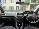 2013-peugeot-208-12-active-3d-small-4