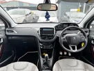 2014-peugeot-208-16e-hdi-roland-garros-small-9