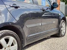 2009-suzuki-swift-13td-small-27