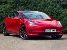 2020-tesla-model-3-e-performance-small-1
