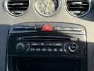 2012-peugeot-rcz-20td-gt-small-18