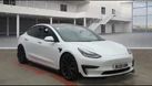 2020-tesla-model-3-e-performance-small-0