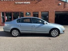 2009-volkswagen-passat-20td-bluemotion-2-saloon-4d-small-2