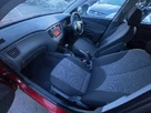 2010-kia-rio-14-strike-auto-small-21