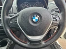 2012-bmw-1-series-20td-116d-sport-hatchback-5d-small-9