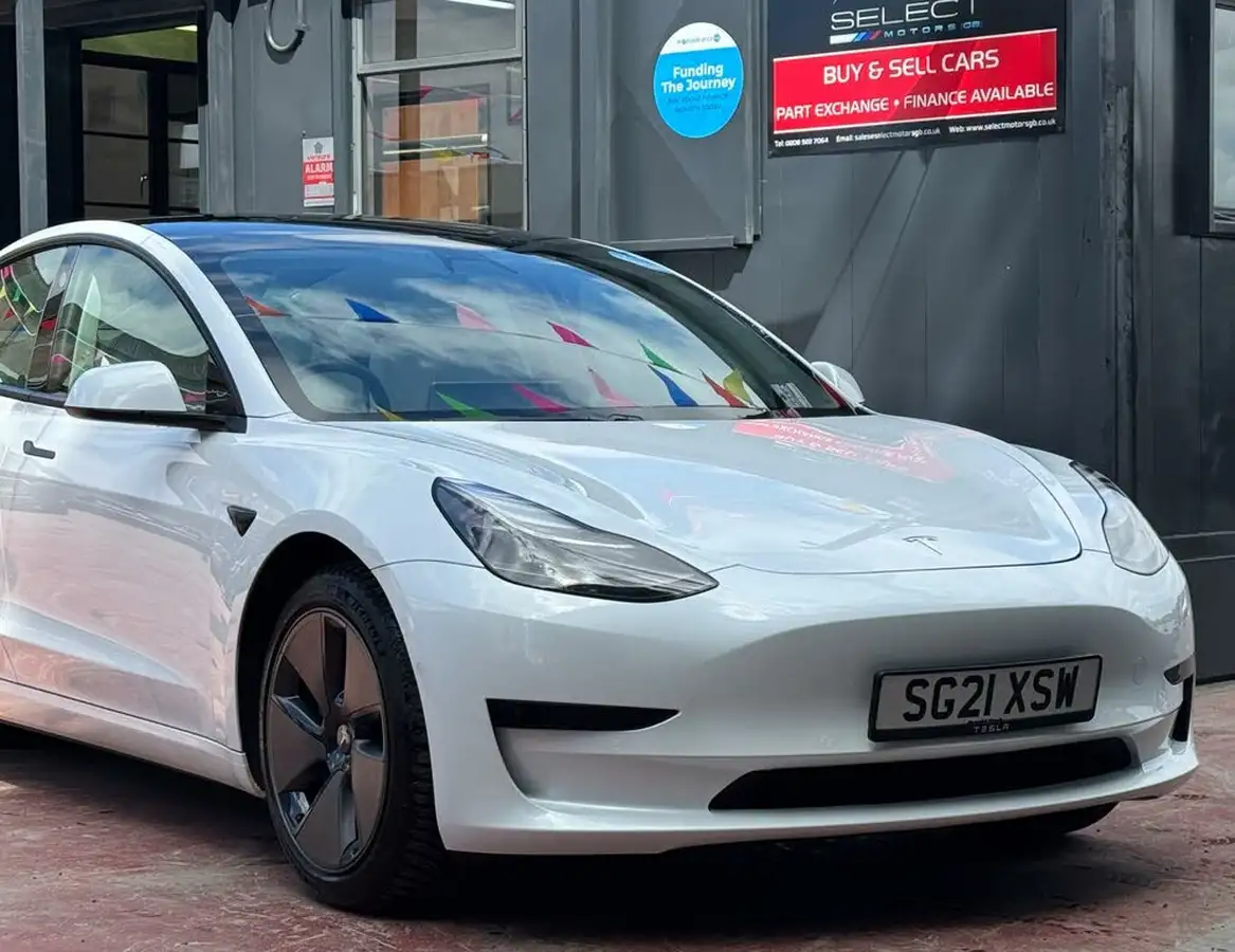 2021-tesla-model-3-e-long-range-4x4-big-1