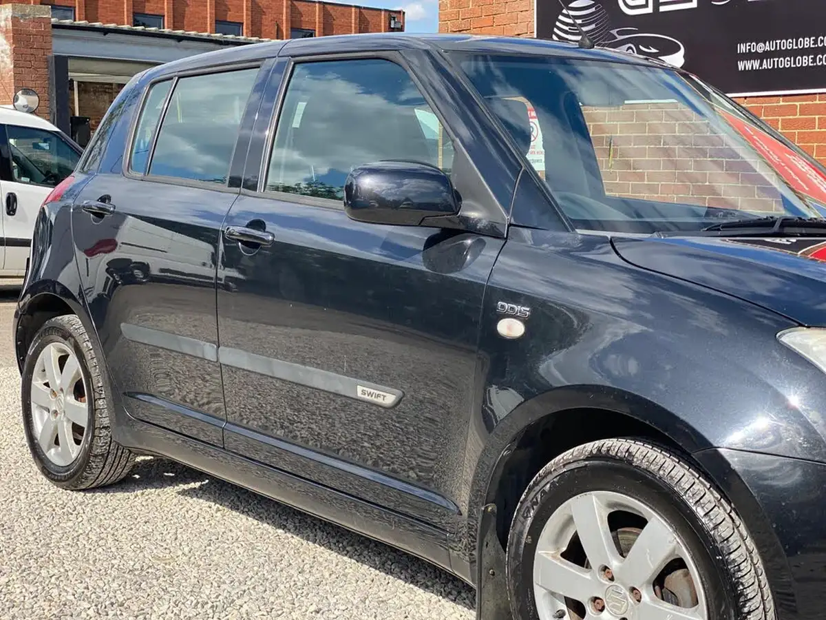 2009-suzuki-swift-13td-big-18
