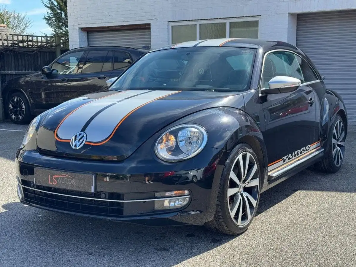 2014-volkswagen-beetle-20-turbo-silver-tsi-210ps-dsg-big-7