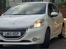 2013-peugeot-208-12-active-3d-small-25