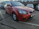 2010-kia-rio-14-strike-auto-small-11