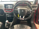 2013-peugeot-208-16-gti-small-8