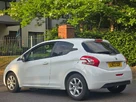 2013-peugeot-208-12-active-3d-small-40
